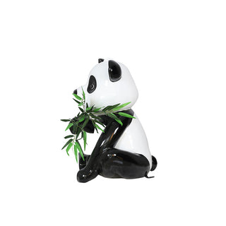 Panda Cub Eating Bamboo